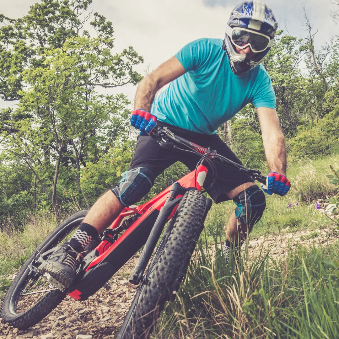 person on a red e-bike